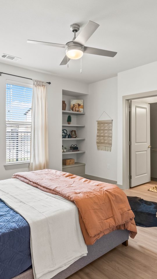 a bedroom with a bed, dresser, and mirror at The La Ventana